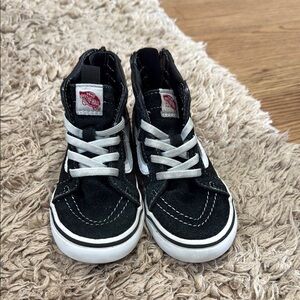 Vans Black and White High-Top Sneakers